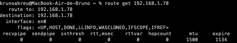 Resultado do comando route get, confirmando que a interface usada para alcançar o servidor era a en0.